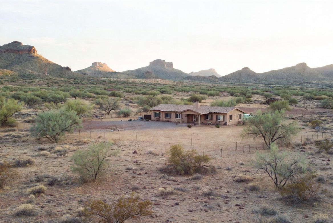 A single-story home on a large rural desert parcel in Pinal County, Arizona